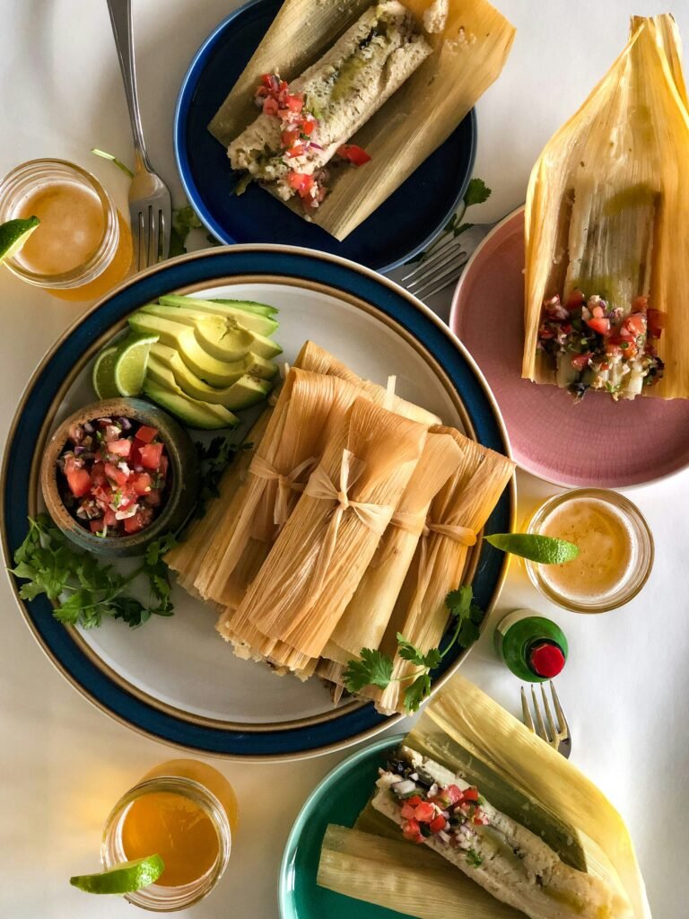 Tamales on a blue and white plate. Made from Masa Harina