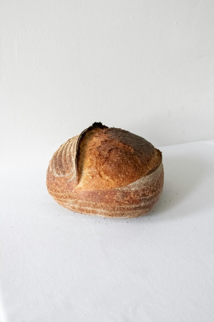 A round loaf of sourdough bread